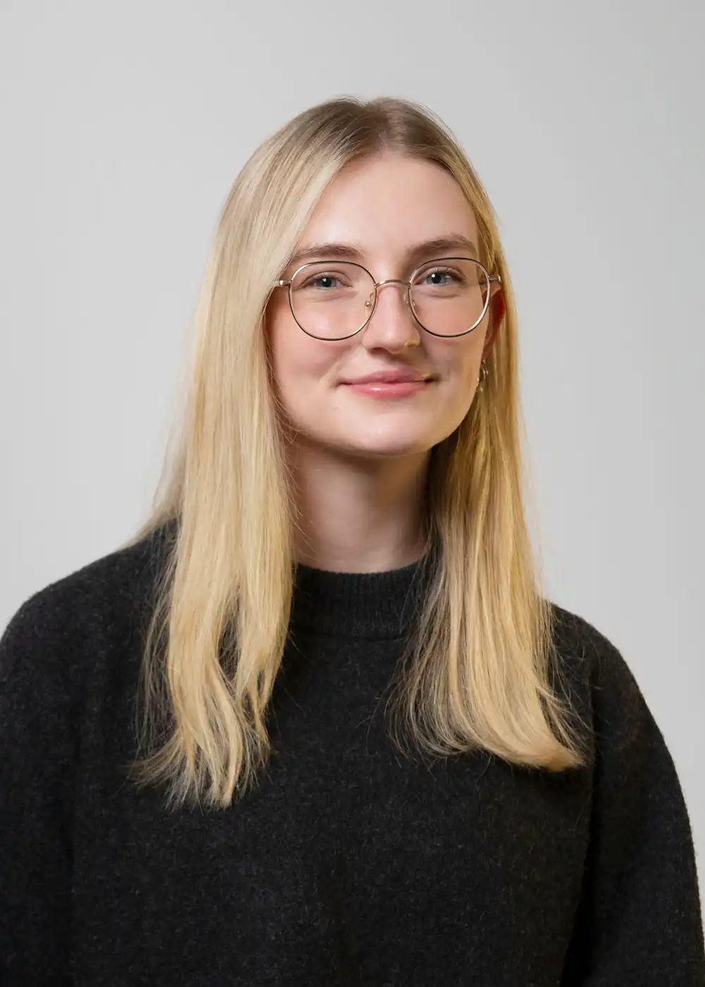 Portrait photograph of staff member Tiff Nicols
